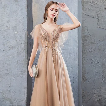 2021 Luksuzno večernja haljina boje šampanjca Трапециевидные aplicirano zrna s V-izrez i otvorenim leđima Elegantne vjenčanice za goste prom djeveruše