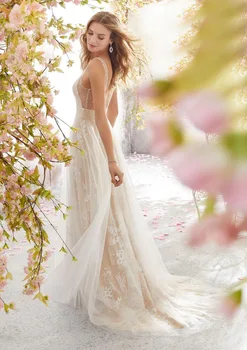 Držači vjenčanje mrežaste haljine 2021 Vestidos De Noiva V-oblika dekoltea s otvorenim Leđima Aplicirano Bez rukava vjenčanica Kraljevski petlja